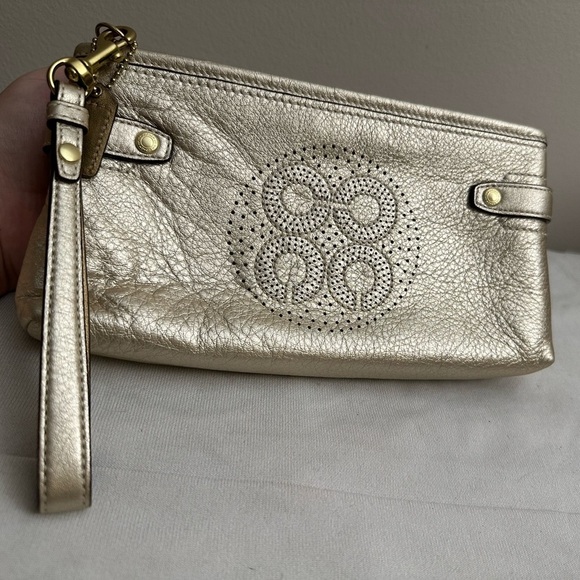 Coach-Pale Metallic Gold Laser etched Logo Clutch Wristlet - Picture 1 of 9